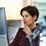 Woman looking at computer screen