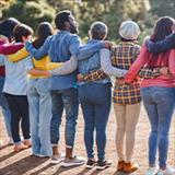 Rearview of diverse people hugging each other
