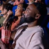 young couple at a movie theater