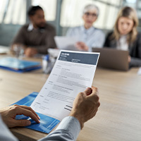 Hiring manager reviewing resume