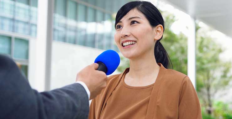 man interviewing woman