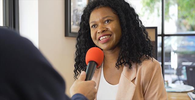 Media interview with Black woman