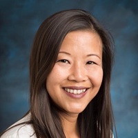 Headshot of Joyce Yip Green.