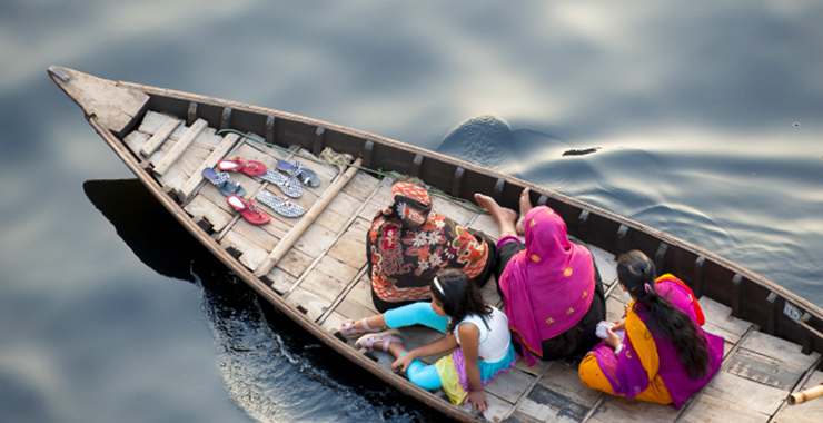 Women on a boat in Dhaka