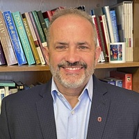 Headshot of Marc J. Tassé.