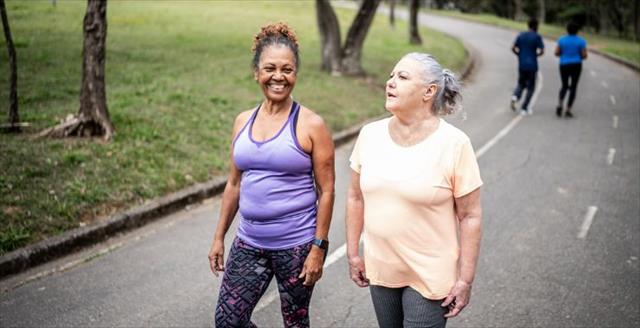 Senior women walking in a park