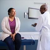woman talking with her physician
