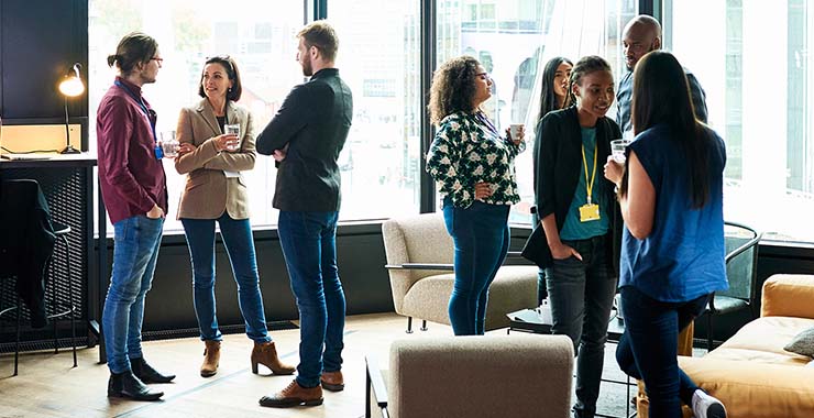 small groups of young professionals socializing