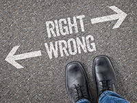man standing at the crossroads of Right and Wrong