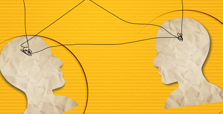 graphic of two heads connected by a wire