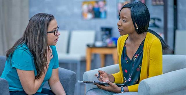 two women talking during a counseling session