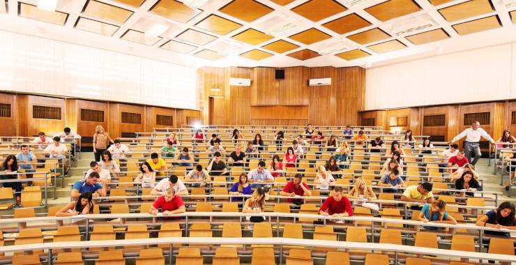 Students sitting in a large lecture hall