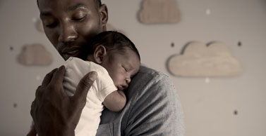 man and baby