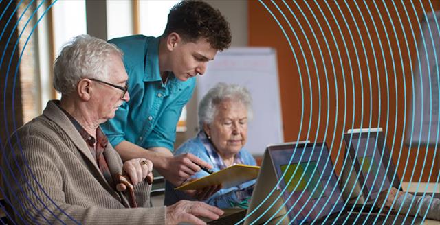 senior couple in a computer class