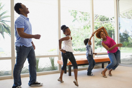 African American family dancing