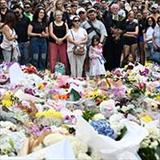 people gathered at memorial for victims of Bondi Beach antisemitic attack