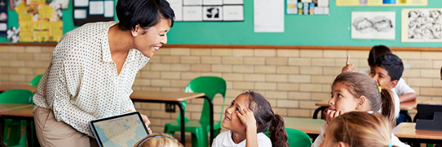 Teacher smiling at her students
