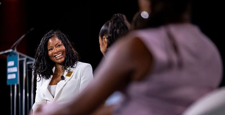 Moderator facilitates panel discussion at APA 2026