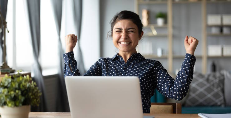 happy woman at computer