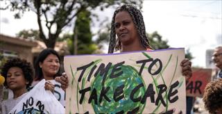 Mature woman at climate change protest