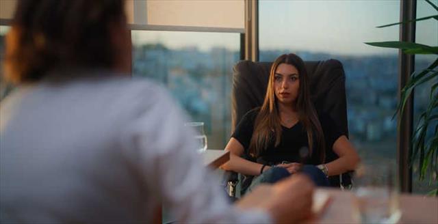 Close-up image of a young woman in therapy