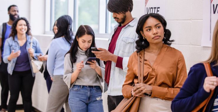 Young group of people waiting in a line