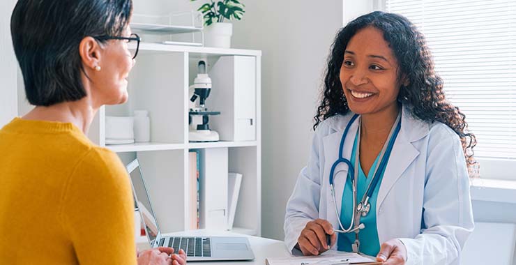 Doctor smiling at patient