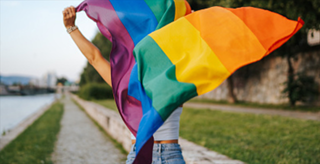 women holding pride flag