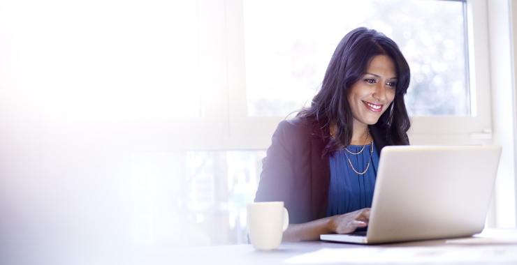 Woman looking at her computer screen