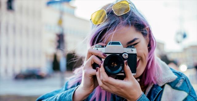 Woman holding a camera