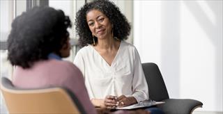 Two women in office setting