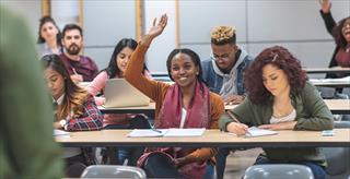 Student raising her hand