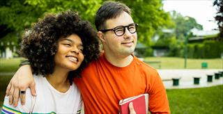 Young couple with learning disabilities spends time together.