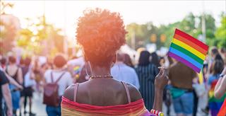 people walking in a pride parade
