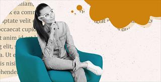 A woman sitting in a blue armchair thinking or pondering