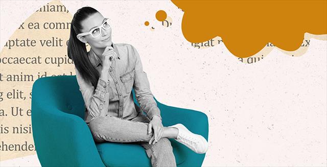A woman sitting in a blue armchair thinking or pondering