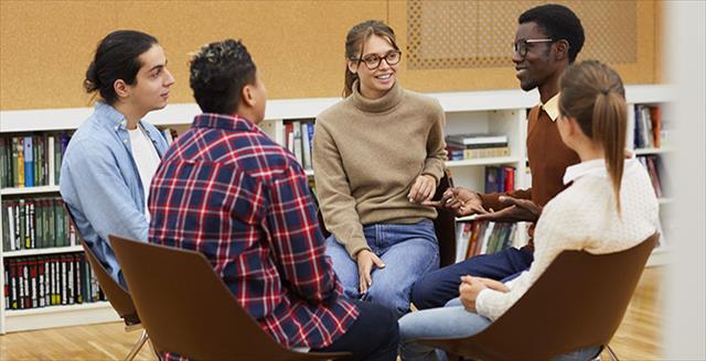 Students meeting in library