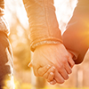 Couple holding hands