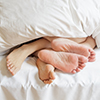 Feet in bed